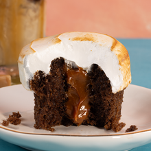 Load image into Gallery viewer, bite shot of a caramel macchiato cupcake. not-bg
