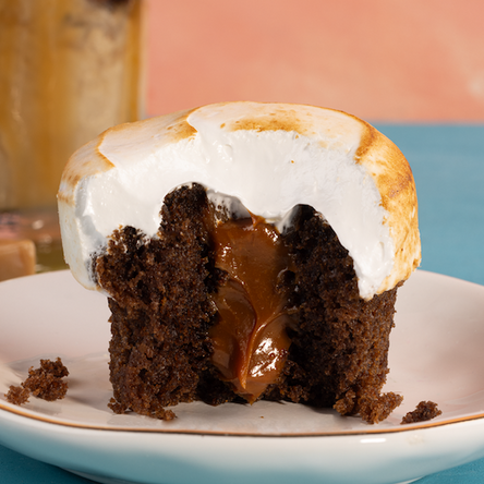 bite shot of a caramel macchiato cupcake. not-bg
